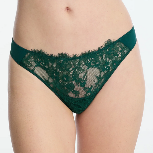 Green lace underwear on a white background