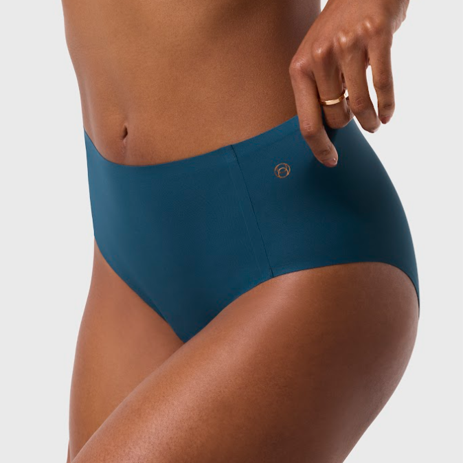 Blue high-waisted bikini bottom on a neutral background