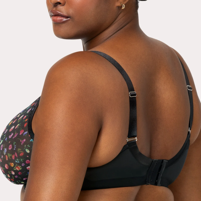 Black bra with floral pattern on a white background