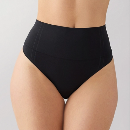 Black high-waisted underwear on a neutral background