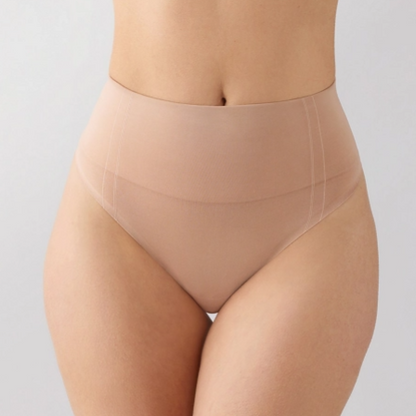 Beige shapewear worn by a person on a light gray background