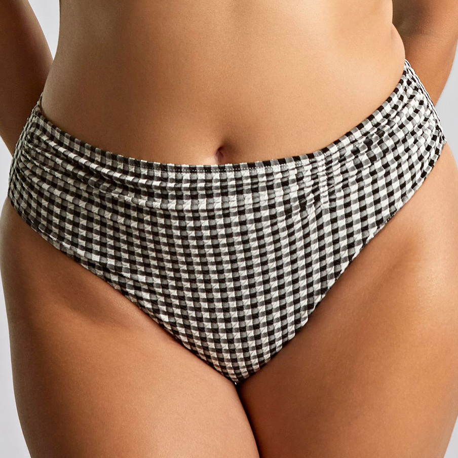 Black and white checkered bikini bottom on a neutral background